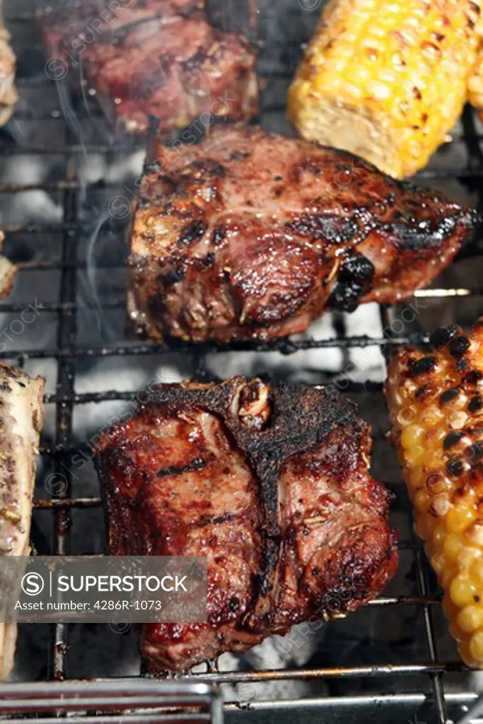 Lamb chops being barbecued on in a grill tray