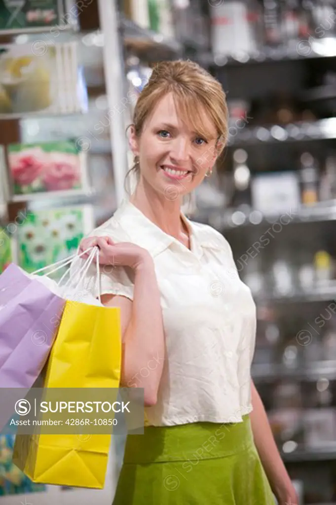 Caucasian female shopper, mid 40s.  PR