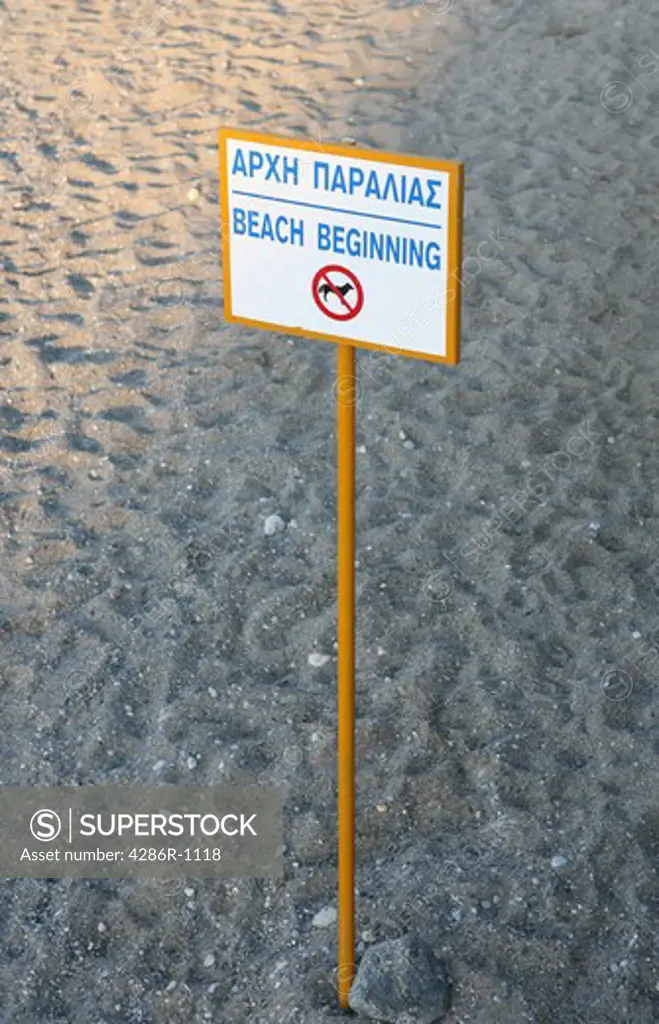 Sign in Greek and English on a clean 'blue flag' beach on Crete, Greece.
