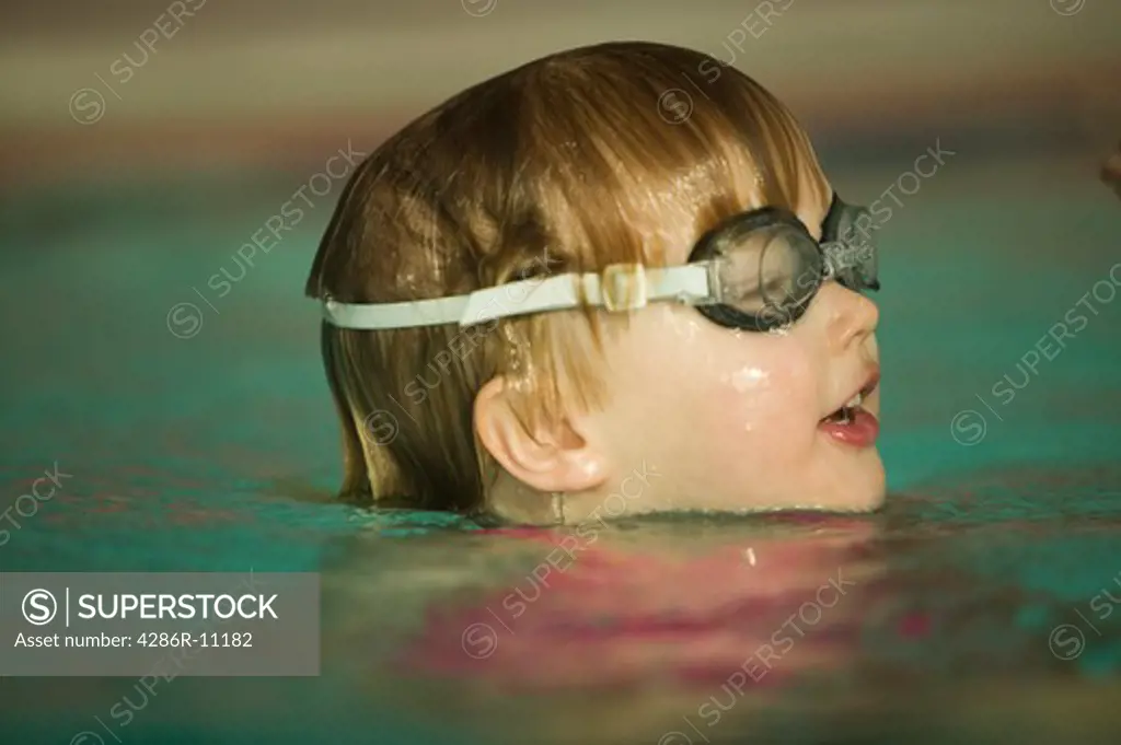 3 year old girl swimming.MR-0420