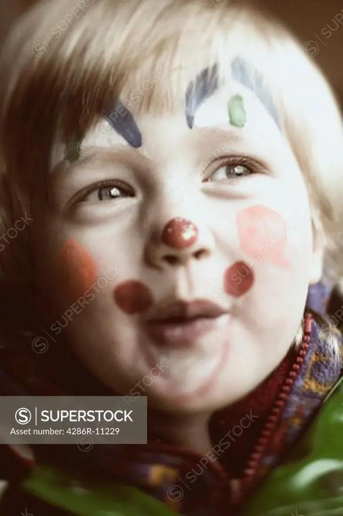 Caucasian girl 3 years old. Clown face painting..MR-0501