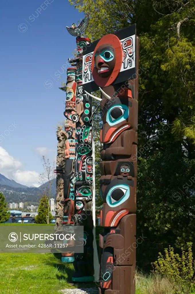 Totem Pole exhibit, Stanley Park, Vancouver British Columbia Canada.-