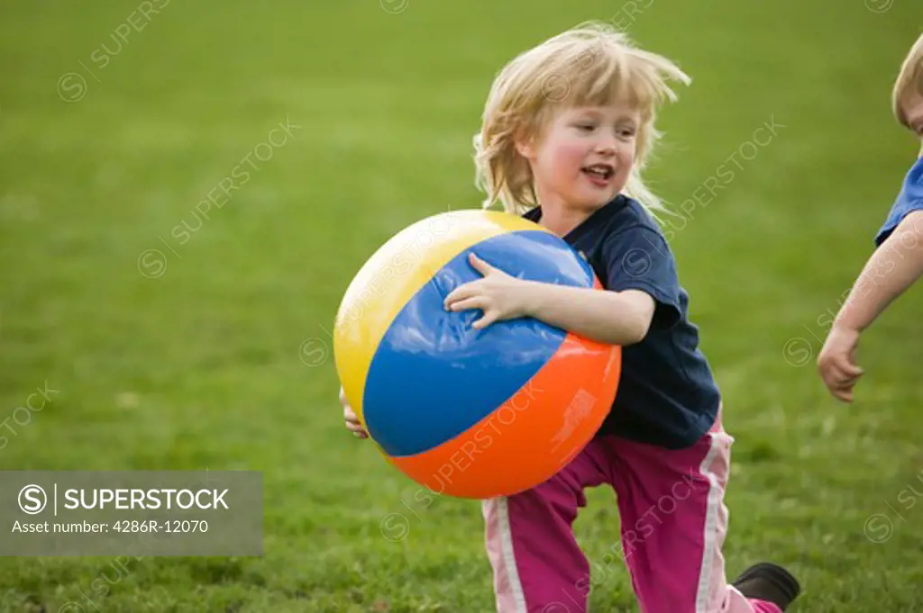 4 Year Old Girl Playing With a Beachball at a Playground, MR-0601 MR-0518