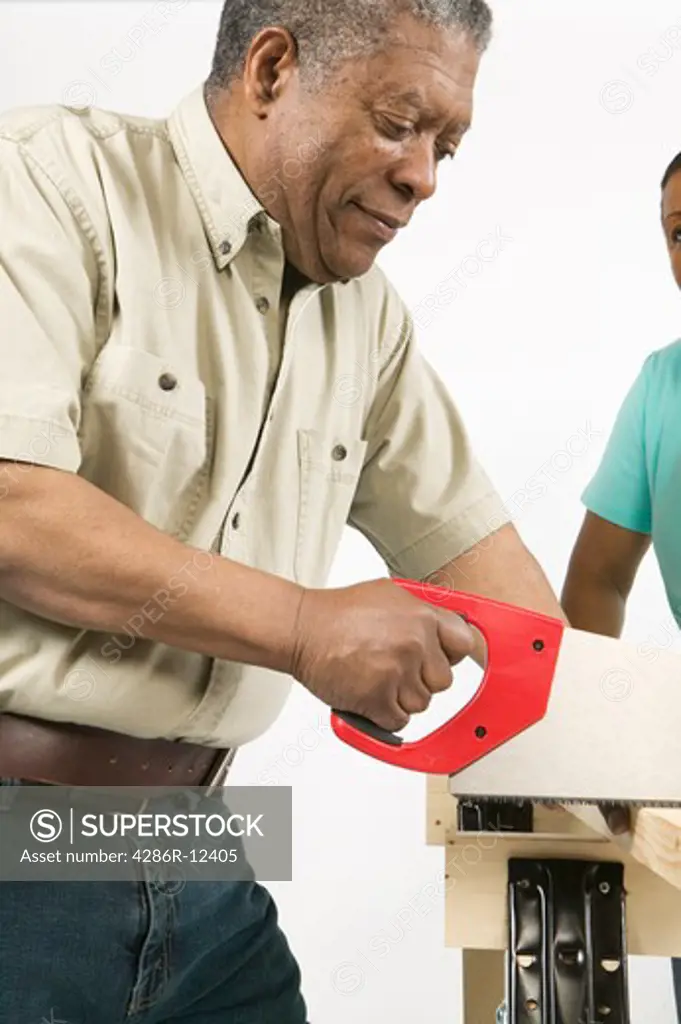 African American Couple Doing Home Improvement Hand Saw, MR-0626 MR-0627
