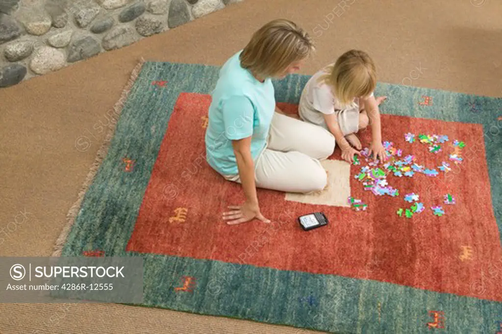Mom Helping With a Jigsaw Puzzle, Blackberry Device Nearby, MR-0652 MR-0654 PR-0655