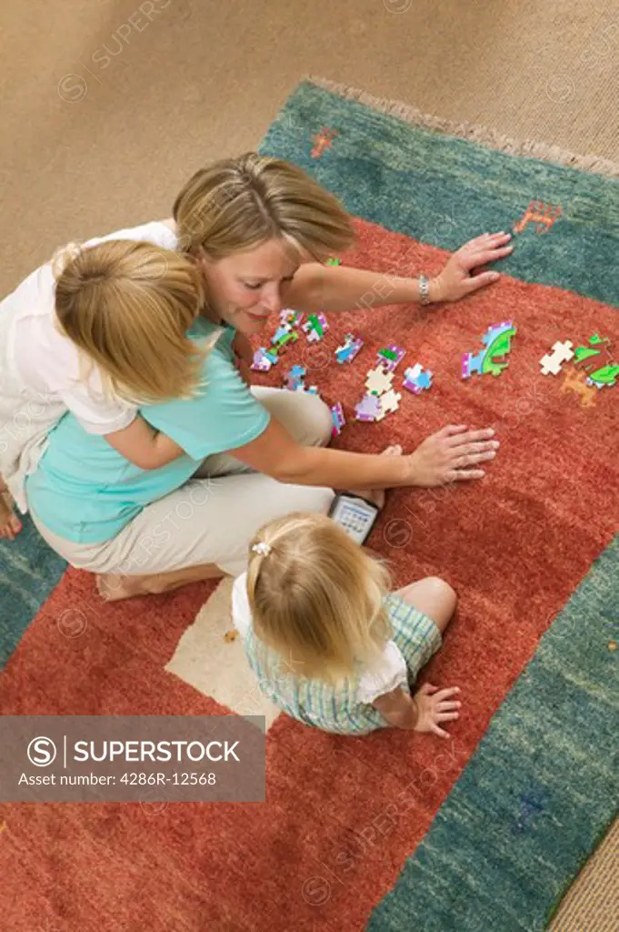 Mom Helping With a Jigsaw Puzzle, Blackberry Device Nearby, MR-0652 MR-0653 MR-0654 PR-0655