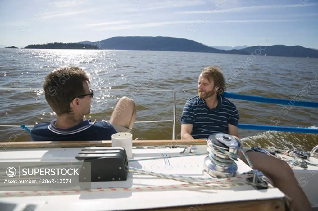 Friends Relaxing on a Sailboat