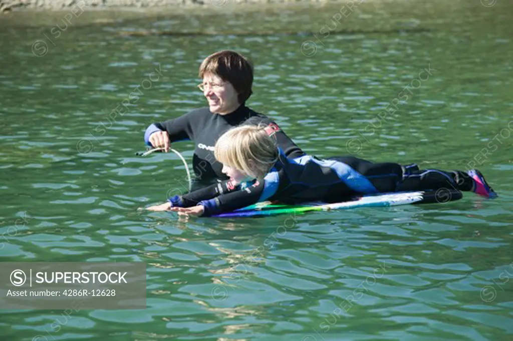 Mom and Daughter Wearing Wetsuits in Cold Water, MR-0601 MR-0602