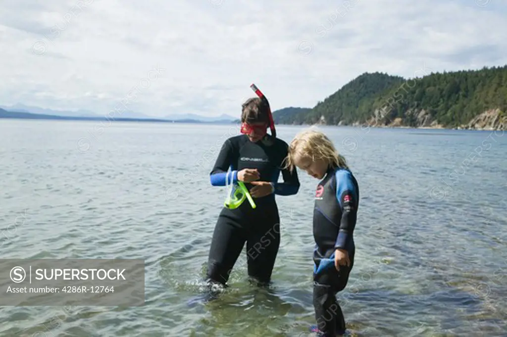 Mom and Daughter Wearing Wetsuits Montague Harbour Galiano Island British Columbia Canada, MR-0601 MR-0602