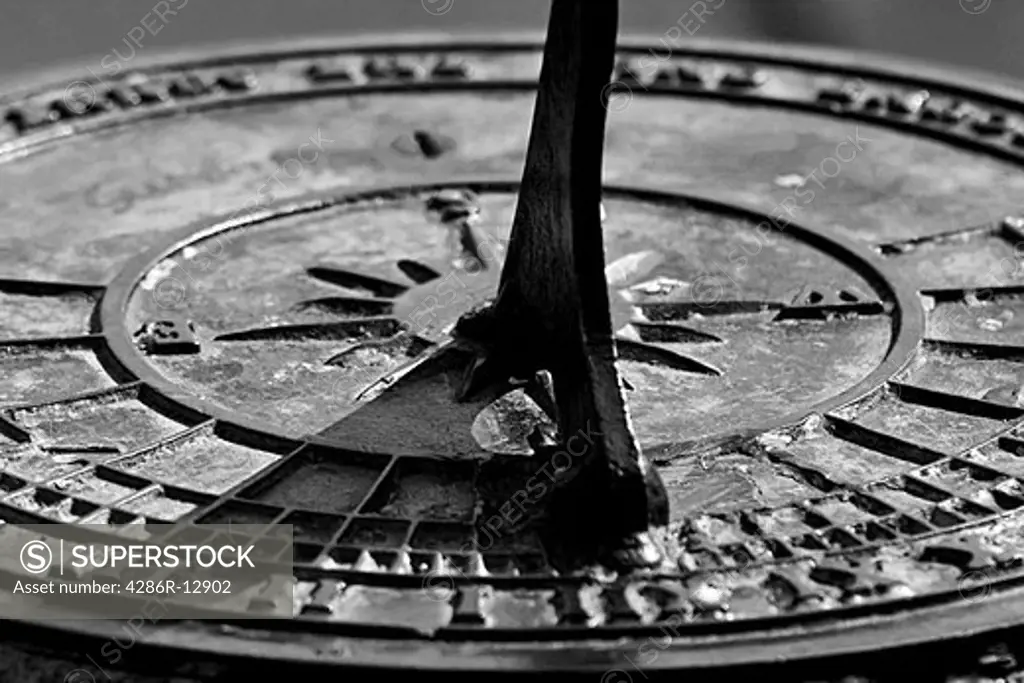 Sundial closeup in black and white high contrast