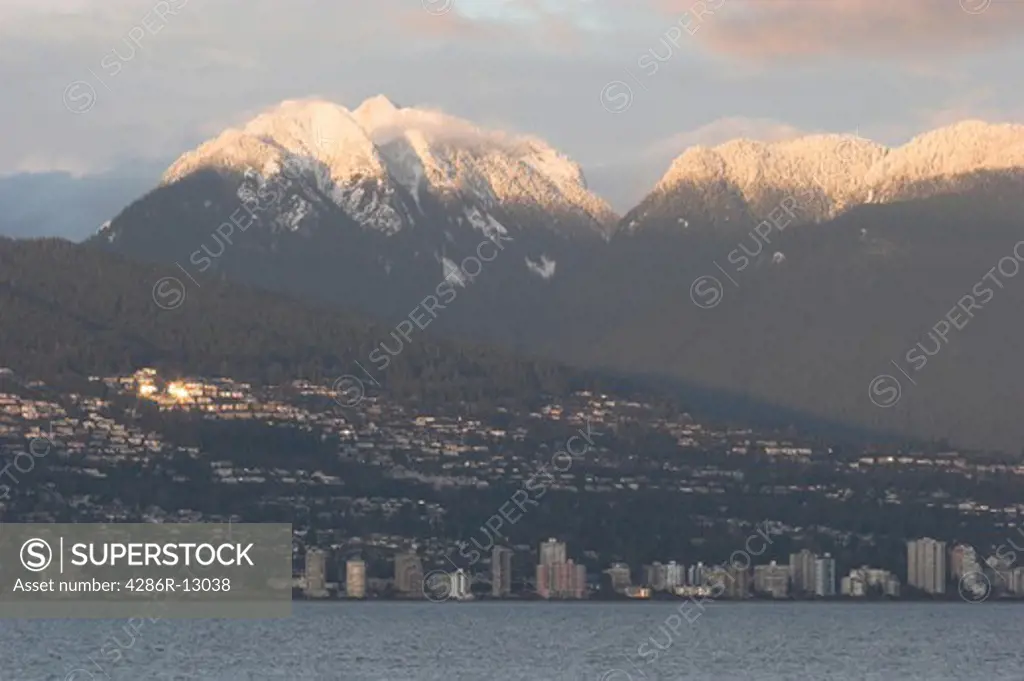 Looking across Burrard Inlet to North Vancouver with snow capped North Shore mountains