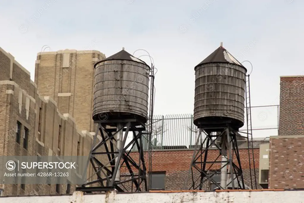 Two old style wooden water tanks on rooftop, Greenwich Village, Manhattan, New York