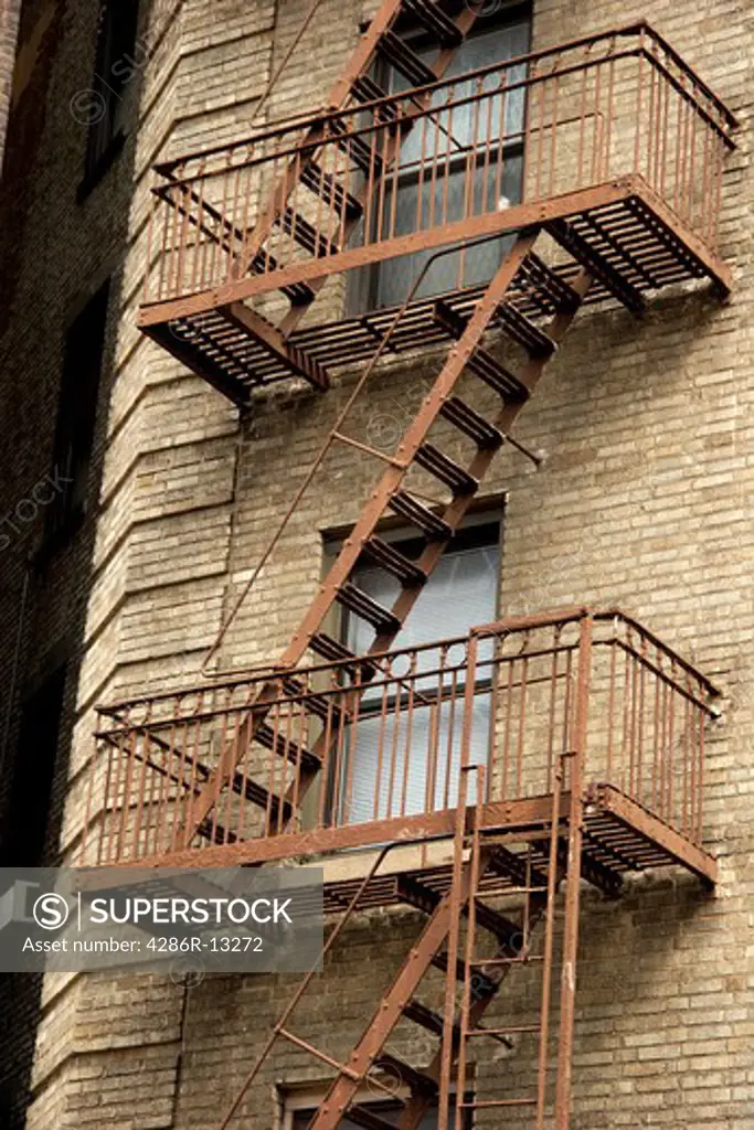 exterior metal fire escapes on apartment building, Greenwich Village, Manhattan, New York