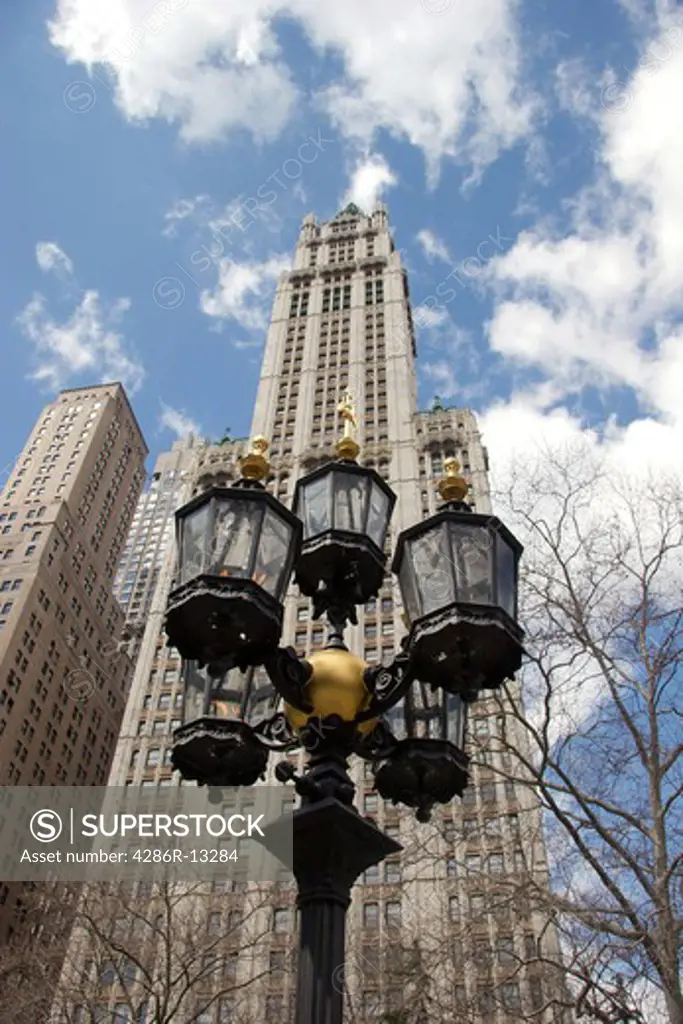 Lamppost and Woolworth Building from City Hall Park, lower Manhattan, New York