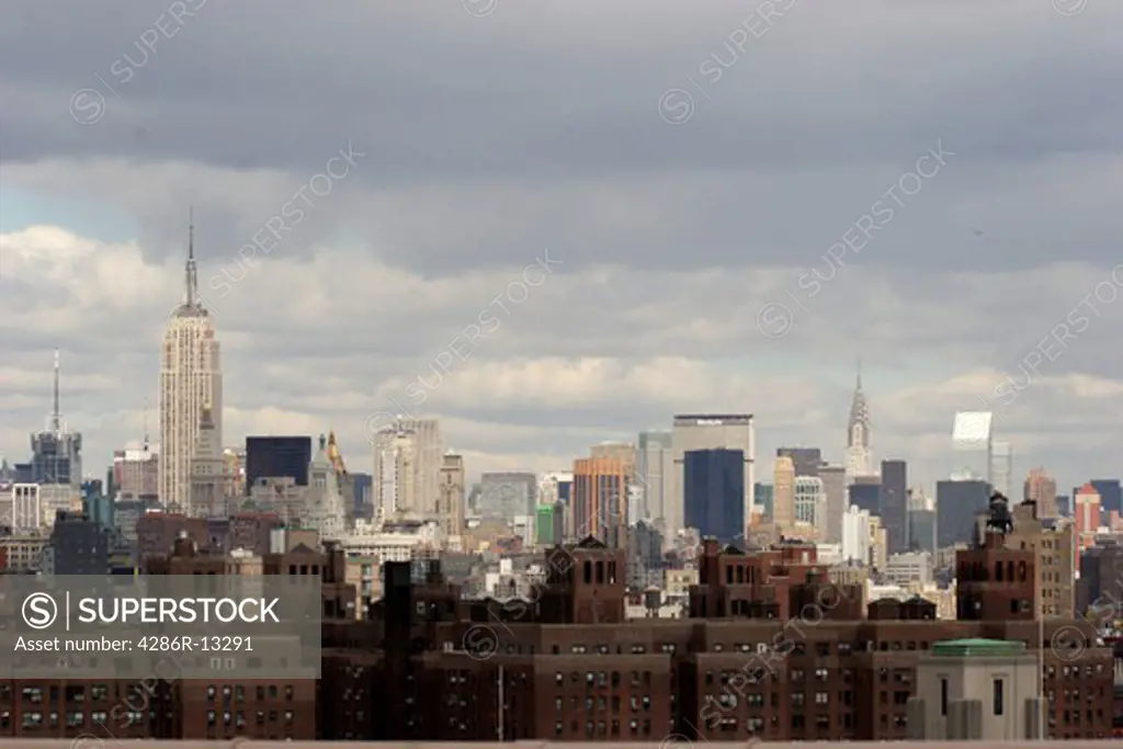 View of midtown Manhattan from the walkway on the Brooklyn Bridge, New York