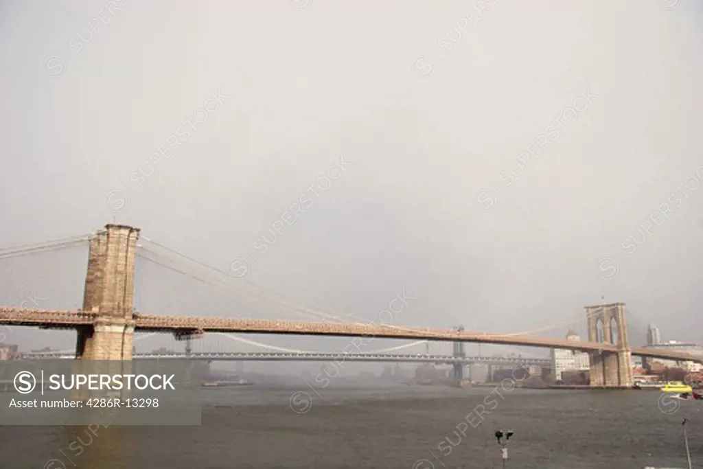 Wide view of Brooklyn Bridge with Manhattan Bridge behind, New York