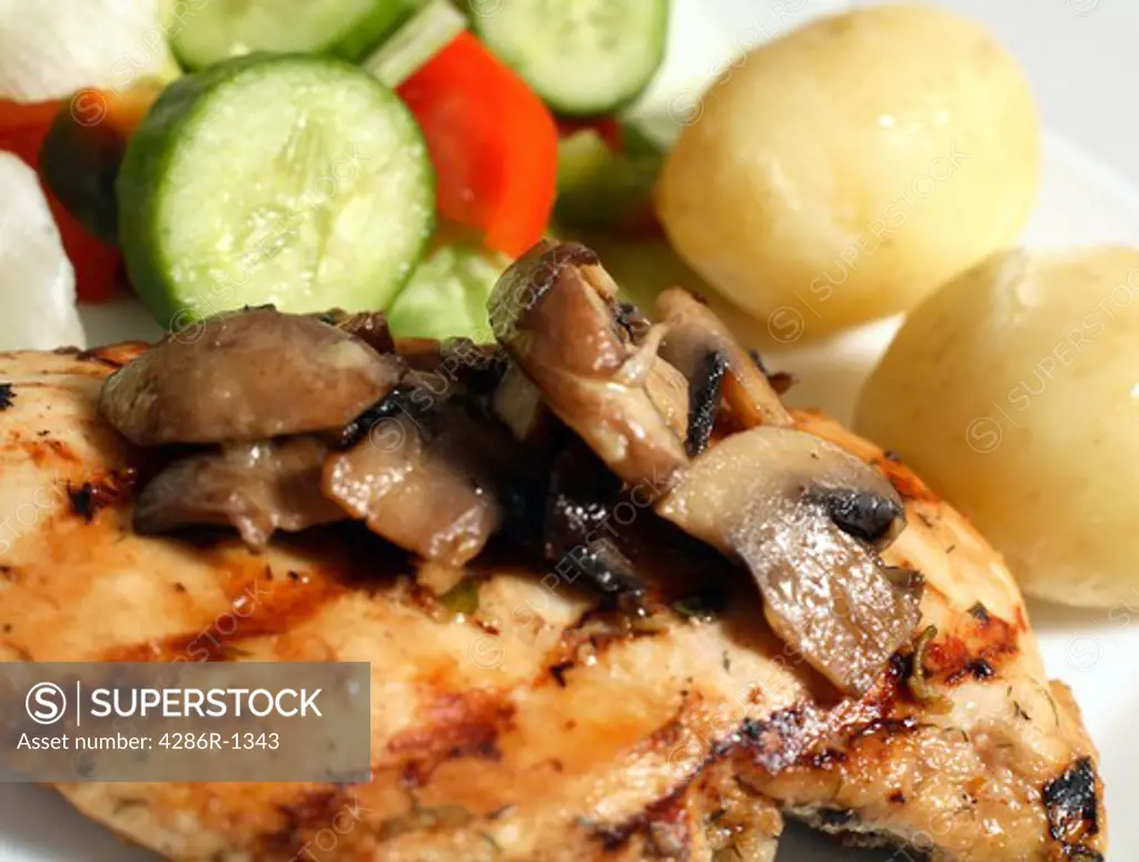 Herbed and marinated grilled chicken breast served with sauteed mushrooms, salad and boild new potatoes. Macro