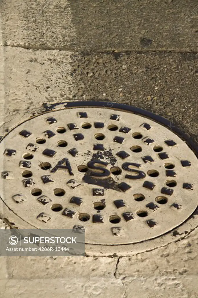 Humorous manhole cover, Downtown Anacortes, Washington State