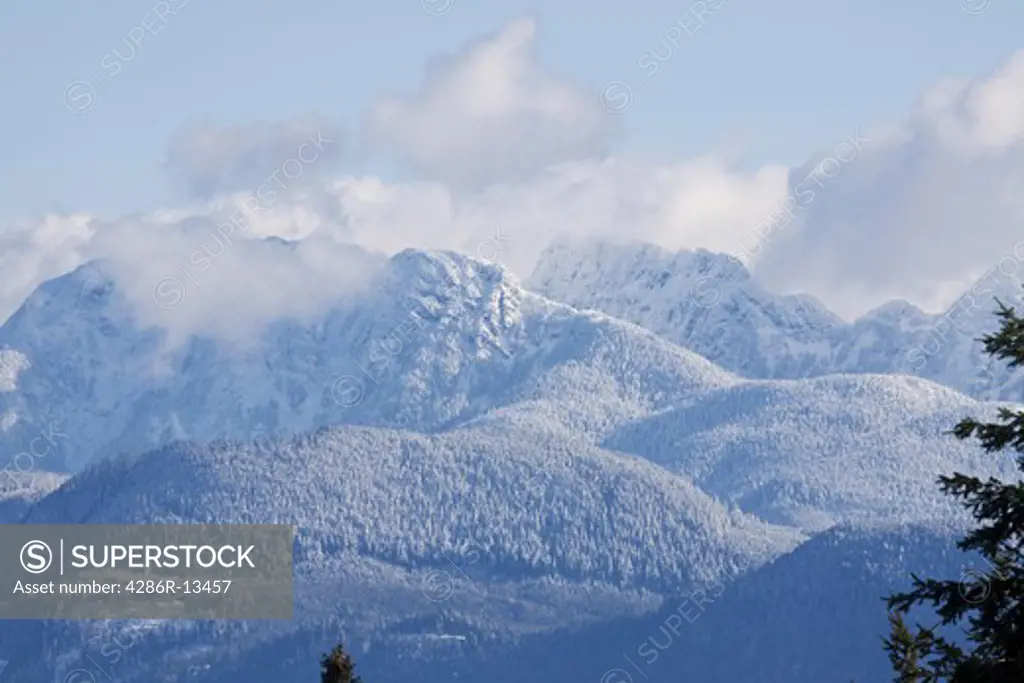Golden Ears in the Coast Mountains of British Columbia, covered in a fresh powdering of snow.