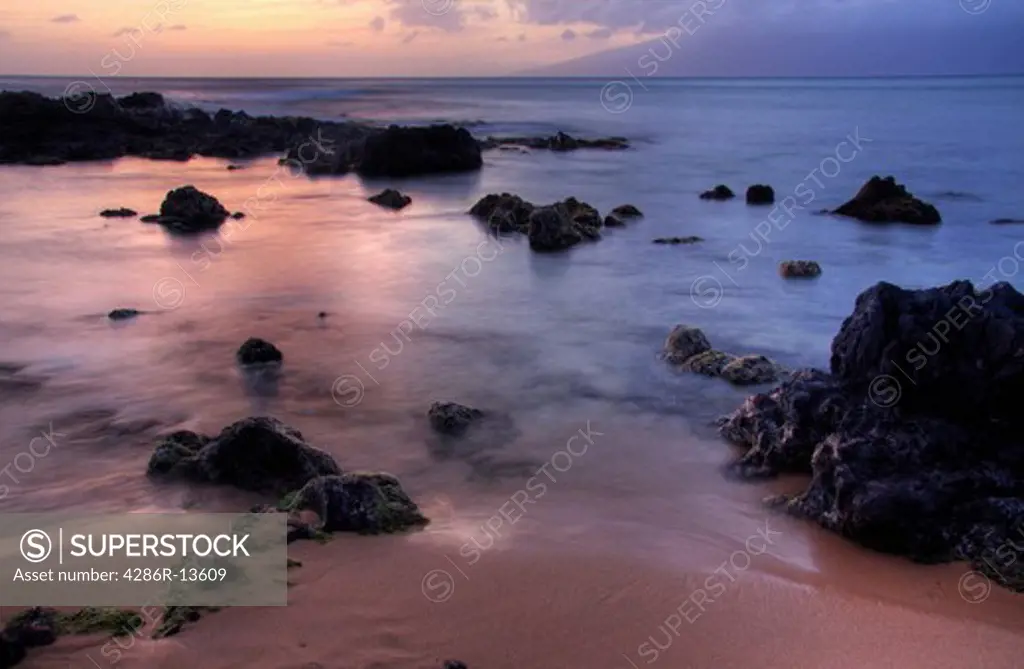Mixed hues and warm tones on the beach at sunset, Maui, Hawaii