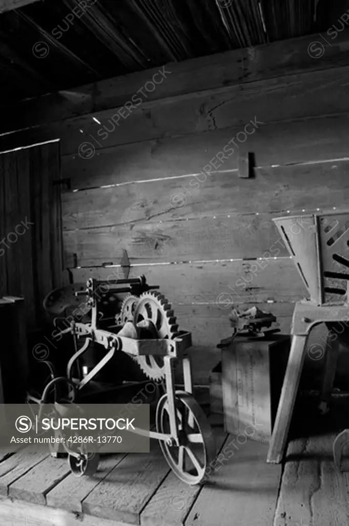 Old farm equipment and gear at Historic Stewart Farm at Elgin Heritage Park, near Crescent Beach, Surrey, BC, Canada. Black and white also avail in color.