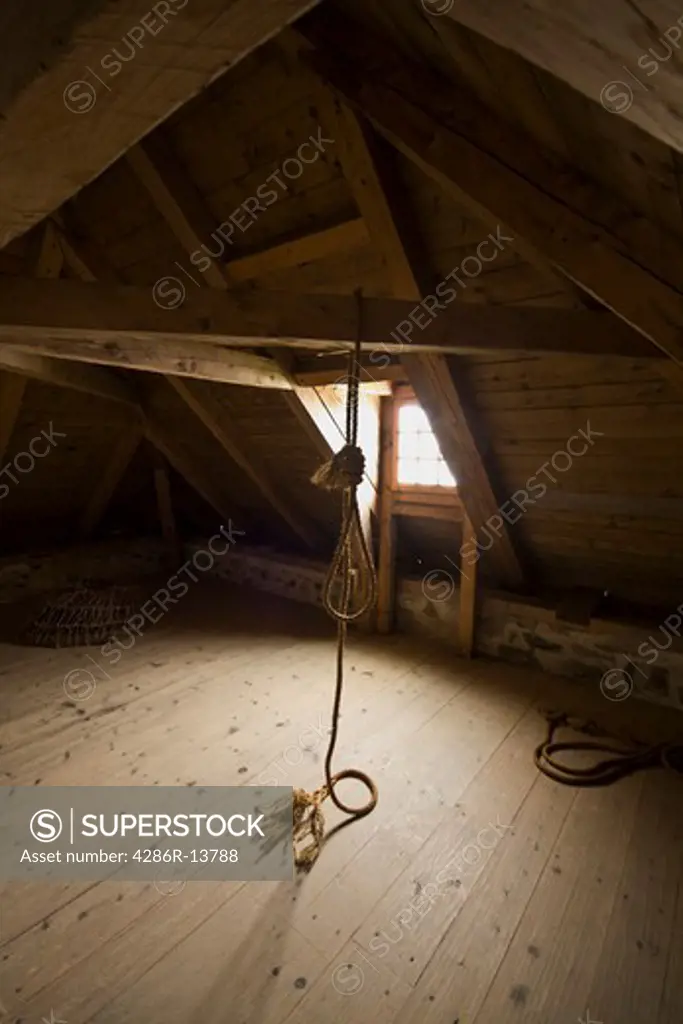 Eerie image of a hangmans noose in storage at Louisbourg National Historic Site, Cape Breton, Nova Scotia, Canada