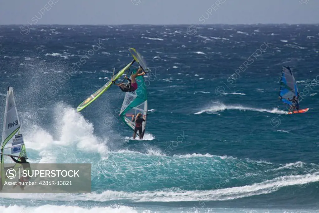 Serious air time. Extreme Windsurfing on Mauis famous Hookipa Beach, located on the windy North Shore.