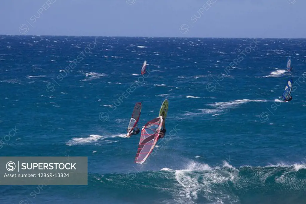Inverted. Extreme Windsurfing on Mauis famous Hookipa Beach, located on the windy North Shore.