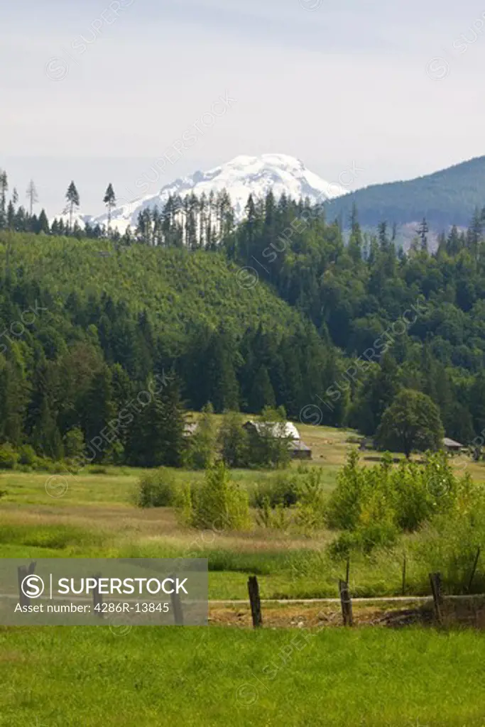 Pastoral country scene with Mount Baker rising behind. Silver Valley, Whatcom County, WA