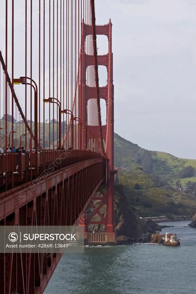 View of Golden Gate Bridge from mid span along the pedestrian walkway. San Francisco Bay, California, USA