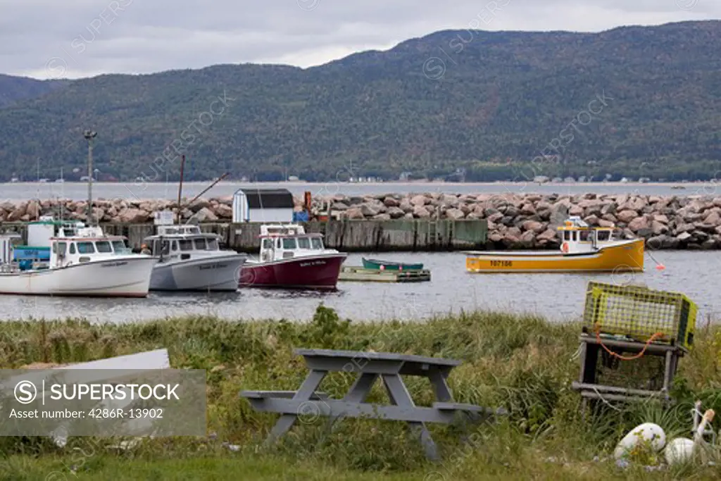 Lobster boats and jetty, Ingonish Point, Cape Breton, Nova Scotia, Canada