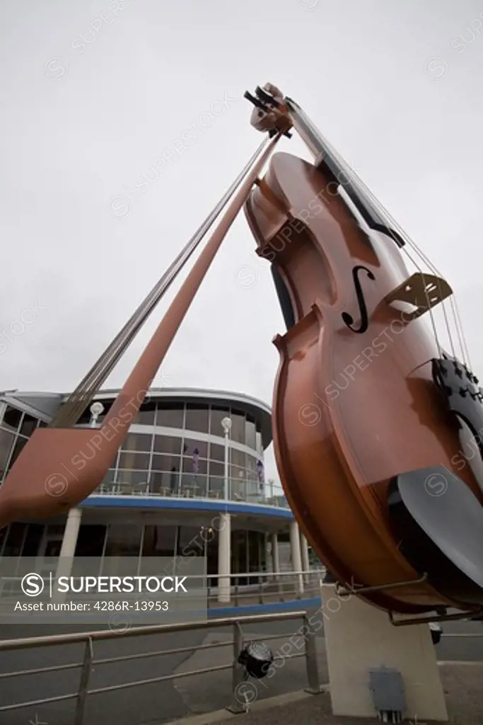 The huge Ceilidh Fiddle welcomes visitors to Sydney, Cape Breton, Nova Scotia, Canada