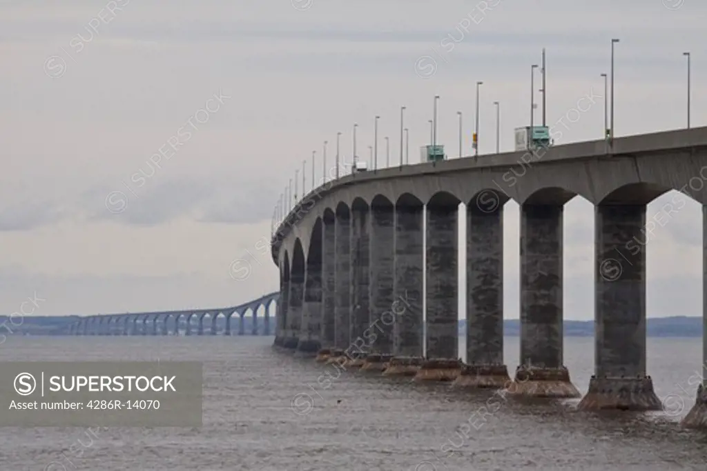 Trucks drive across the 13 Km long Confederation Bridge, linking Prince Edward Island to New Brunswick, Canada