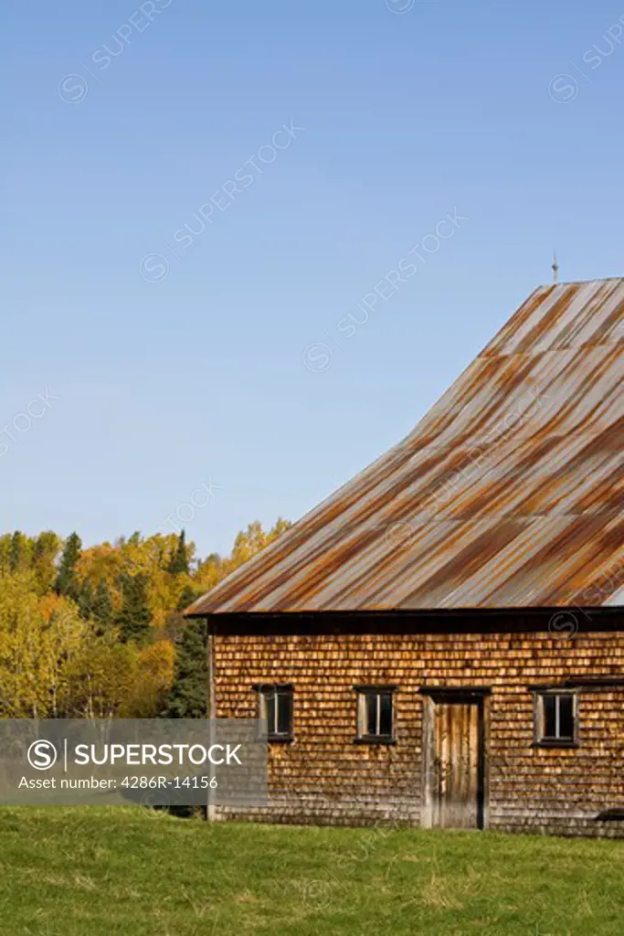 Weathered old barn in autumn, near Campbelton, New Brunswick, Canada