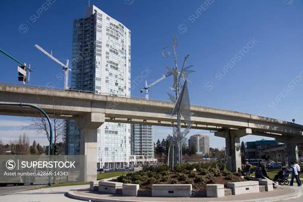 Holland Park with skytrain track overhead, Surrey Central, BC, Canada
