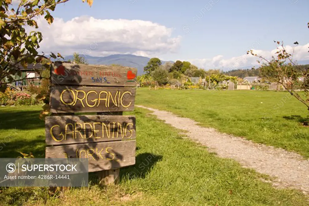 Suburban Community Garden, Colony Farm Regional Park. Signs says organic gardening works.