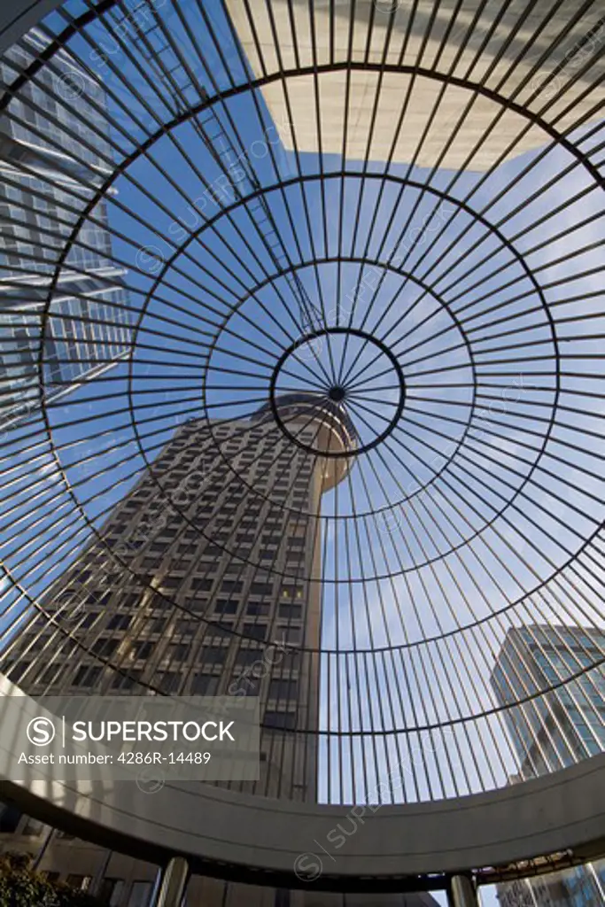 Modern architecture. Harbour Centre as seen through glass domed roof, Vancouver, BC, Canada