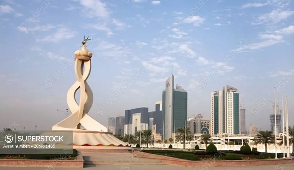 The Oryx monument on the edge of the business tower New District of Doha, backed by new tower blocks. November 18, 2007