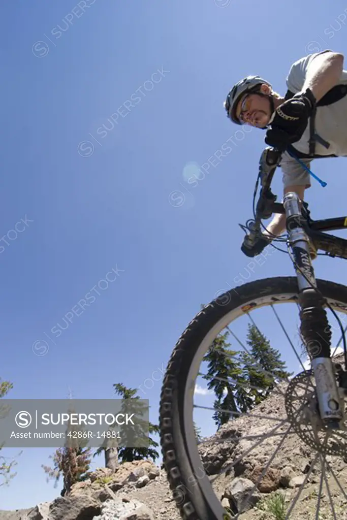 A man mountain biking on Donner Summit in California