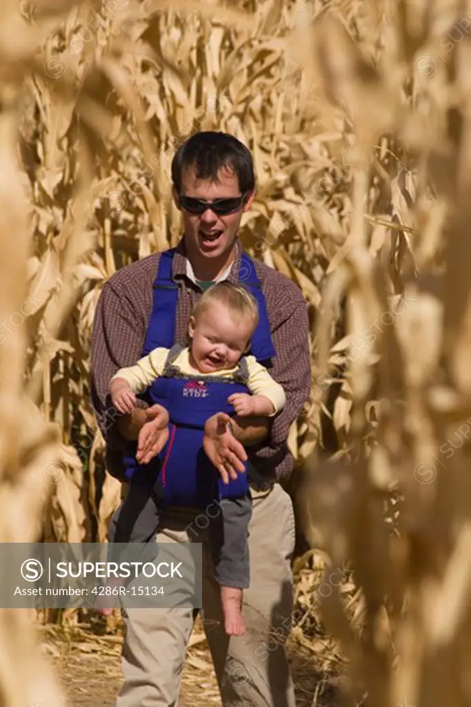 A father and daughter in a corn field in Fallon Nevada
