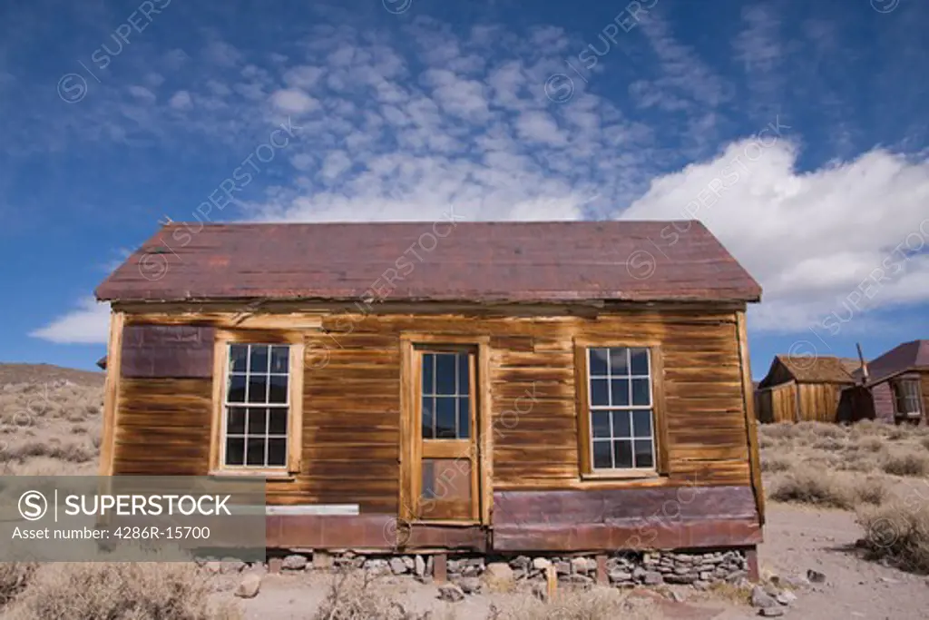 A close-up of an old building and window in Bodie State Park in California