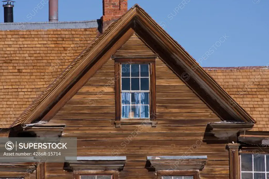 A close-up of an old building and window in Bodie State Park in California