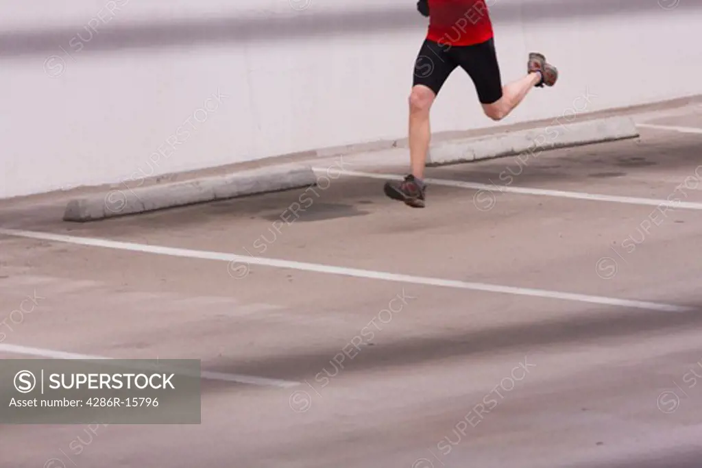A man running in a parking garage in Reno in Nevada