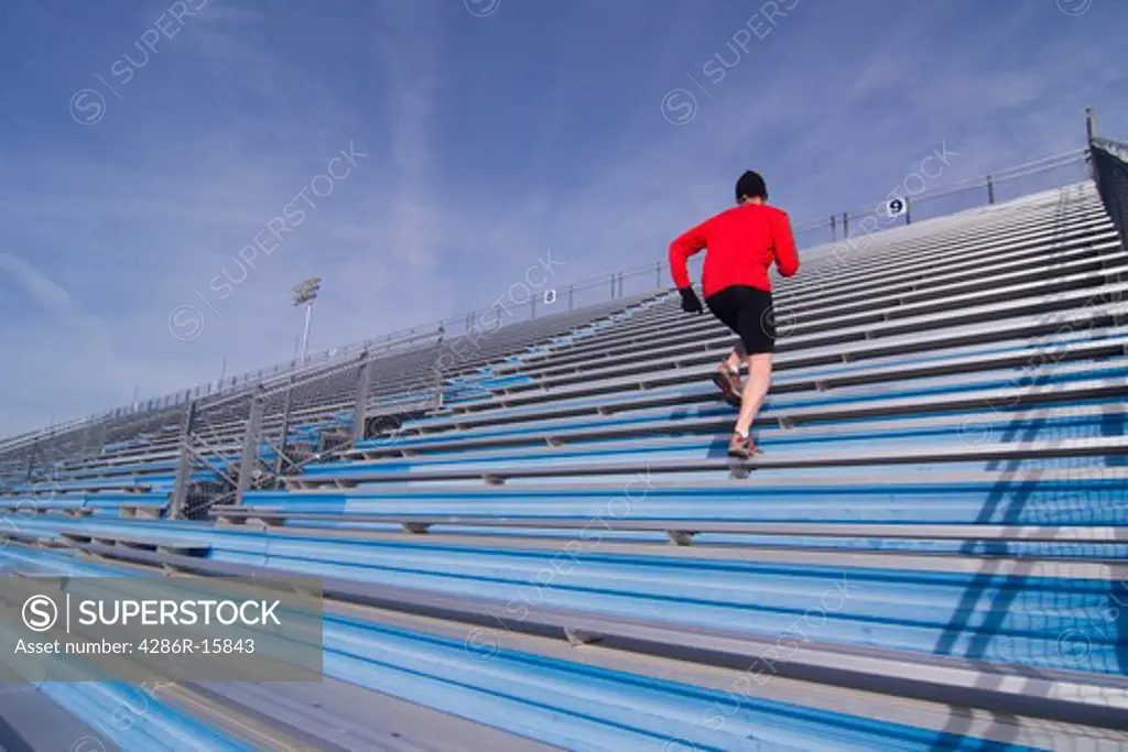 A man running up stairs while training in Reno in Nevada