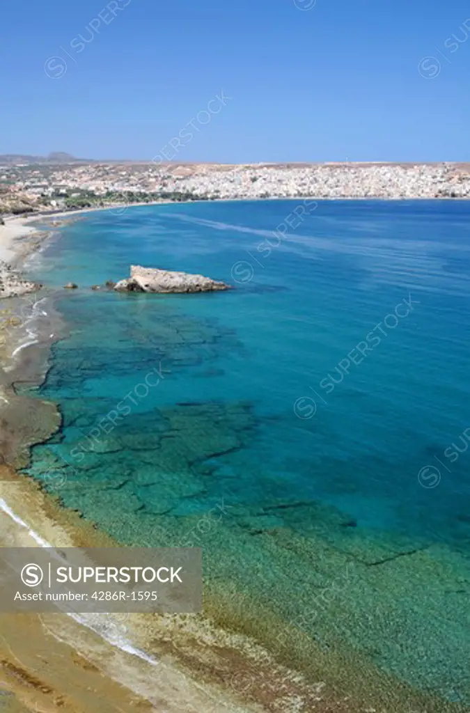Wide-angle view across Sitia Bay, Crete, with Sitia itself, the capital of Lasithi Prefecture in the distance.