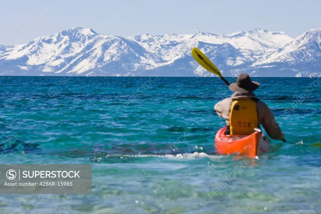 A man sea kayaking on Lake Tahoe near Incline Village in Nevada