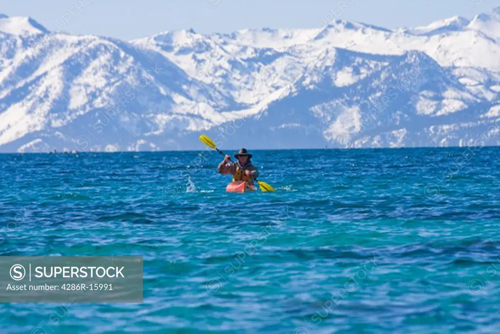 A man sea kayaking on Lake Tahoe near Incline Village in Nevada