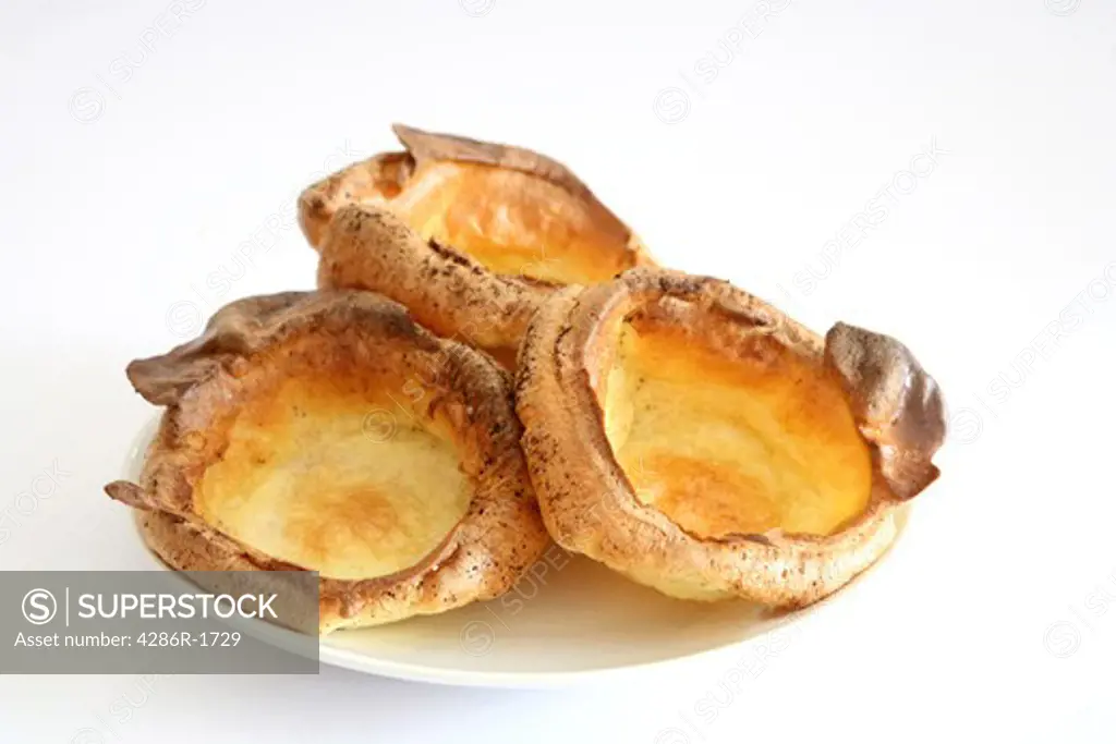 A pile of Yorkshire puddings, a traditional British accompaniment to roast dinners.