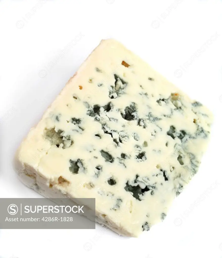 A wedge of Roquefort Marival soft blue French cheese