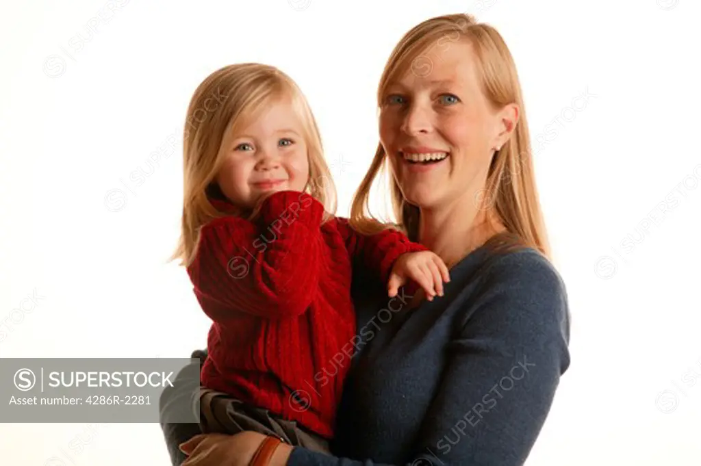 Studio shot of a mother holding her daughter.